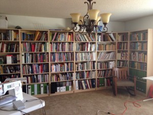 My library. About three of these bookcases are stuffed with quilting books and magazines.